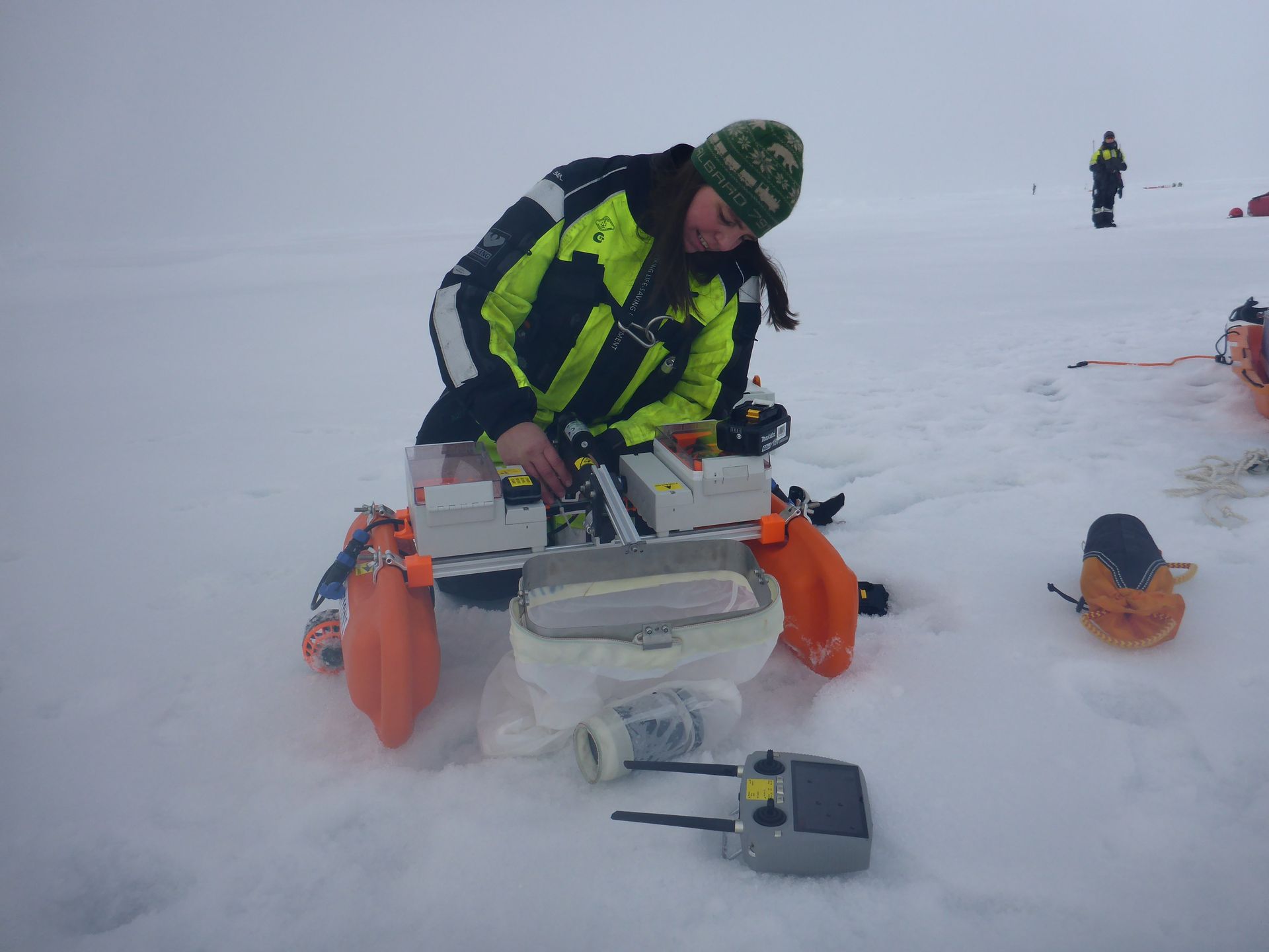 researcher assembling USV Pamela on arctic field cruise
